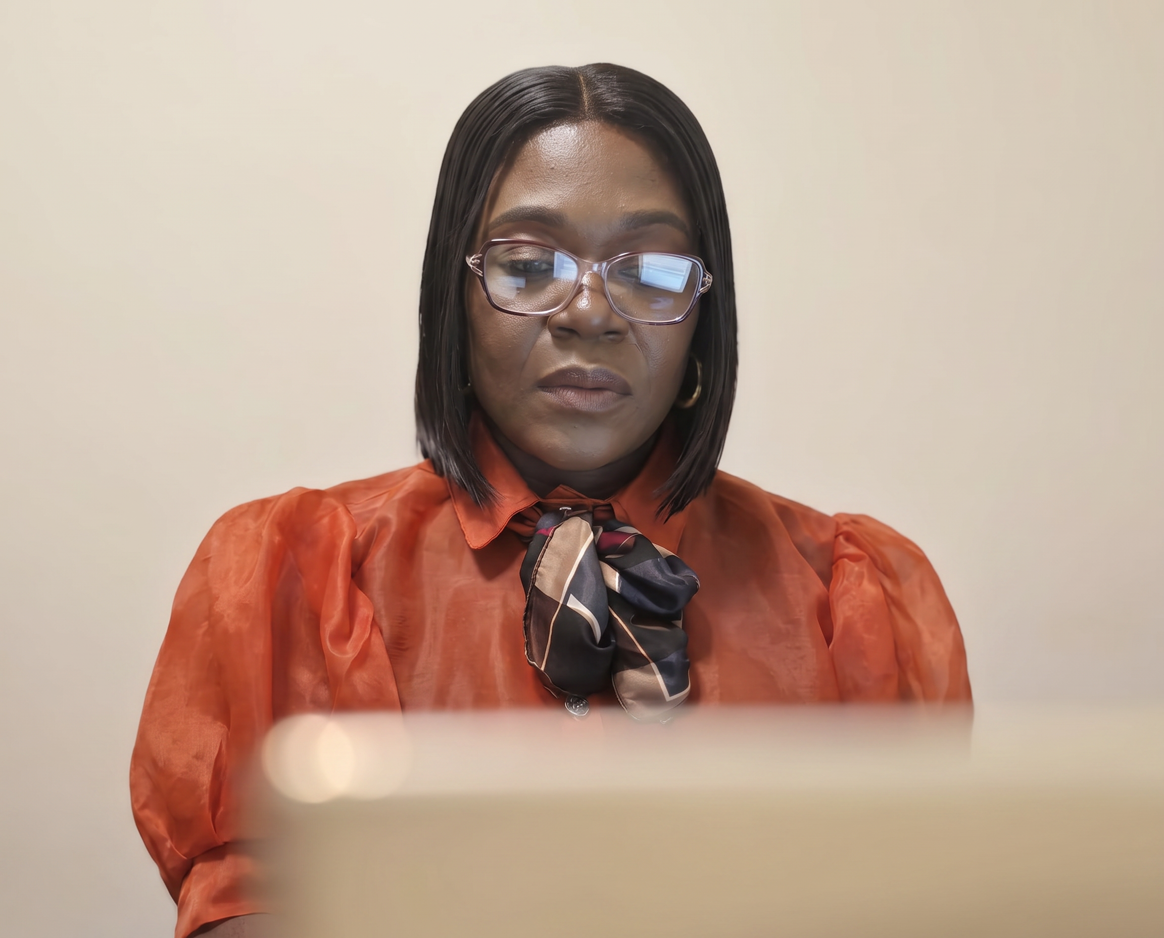 Aunty Kemi, founder and creative director of NEXT Academy, at her desk